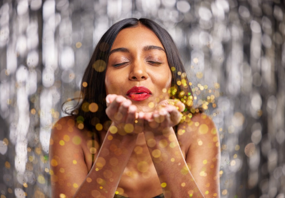 woman glowing gold glitter
