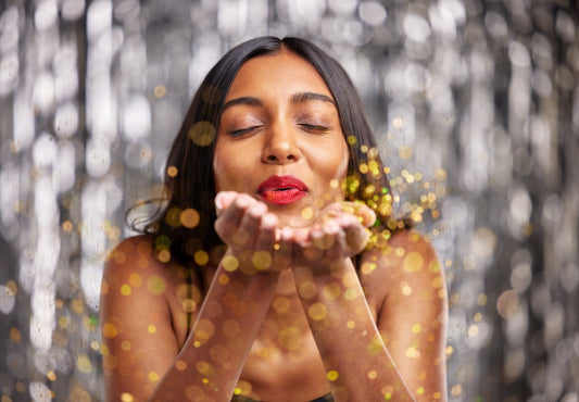 woman glowing gold glitter