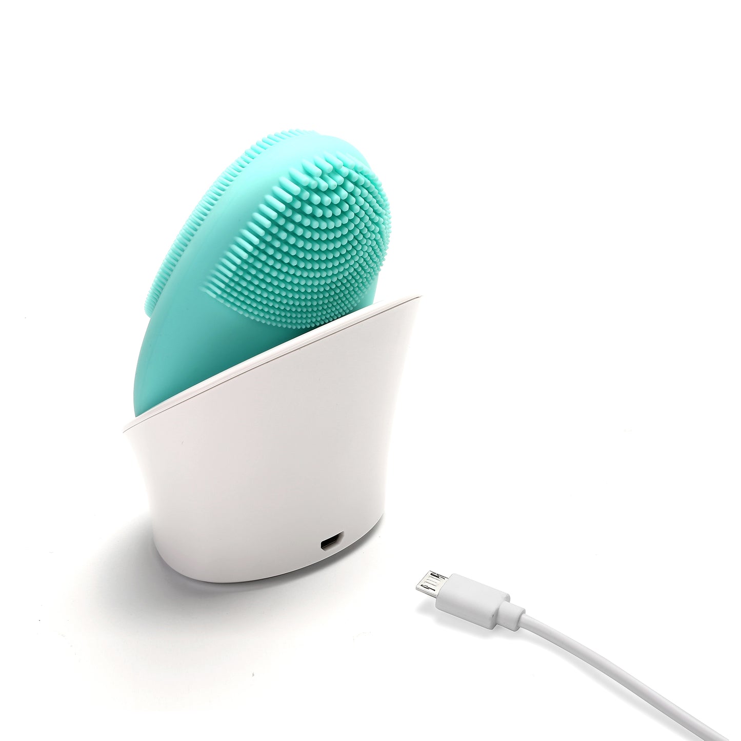 teal sonic brush in charger