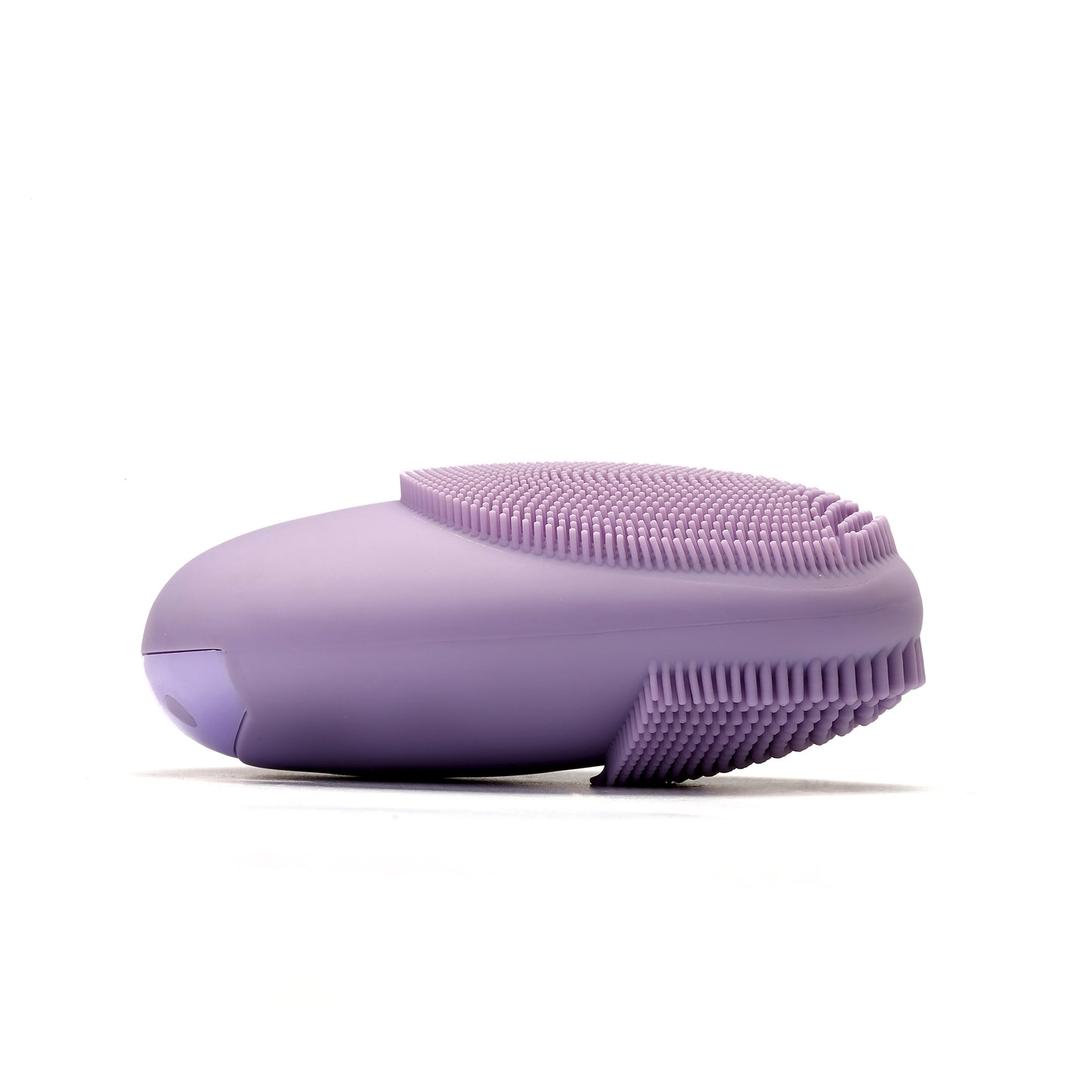 purple sonic brush laying on its side